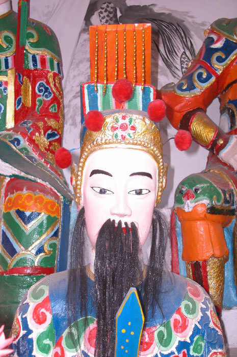 Middle deity of the central altar