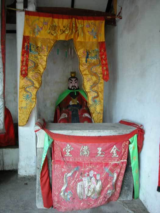 A god in the temple (far right)