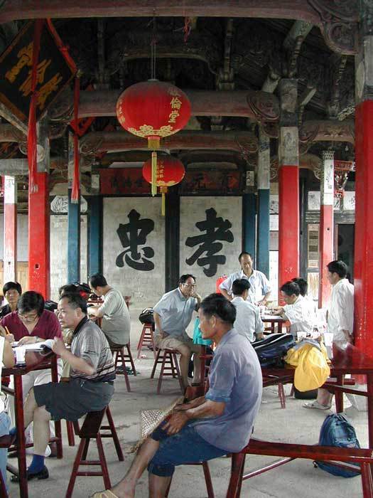 Looking at the right wall. The left character means `Loyalty`; the right character means `Filial Piety`.