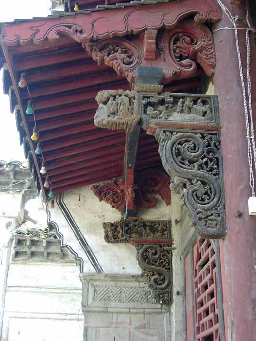 Close up of the interior facade of the main gate -- wooden brackets