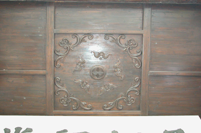 Carving on the ceiling above the plaque Carving on the ceiling above the plaque