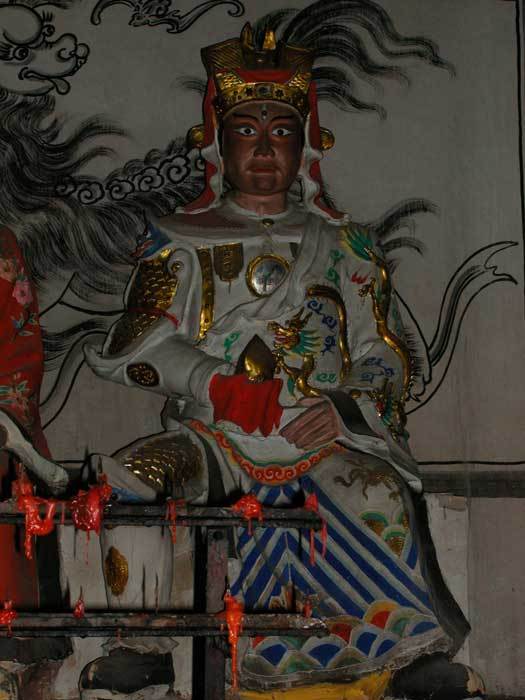 Statues on the near left-hand side of the main hall.close-up of Wealth God