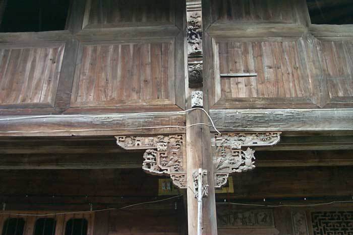 Carved brackets on the right-hand side (2nd pillar).front angle