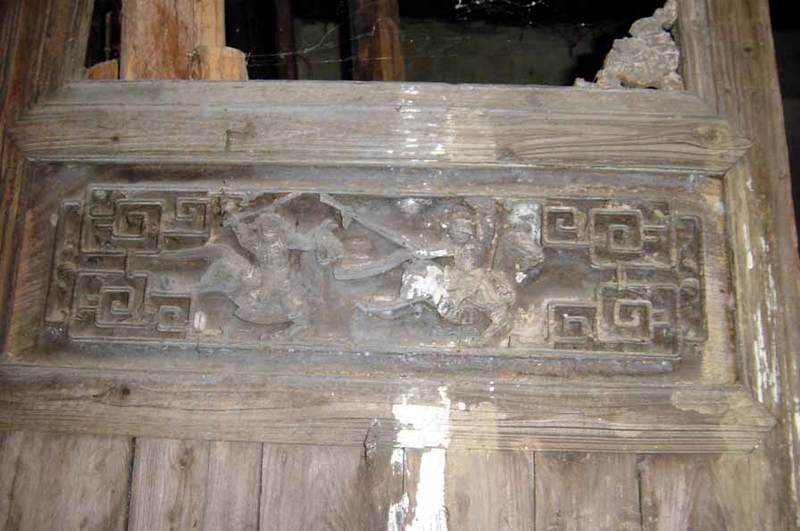 Carvings on a door panel2 Carvings on a door panel2