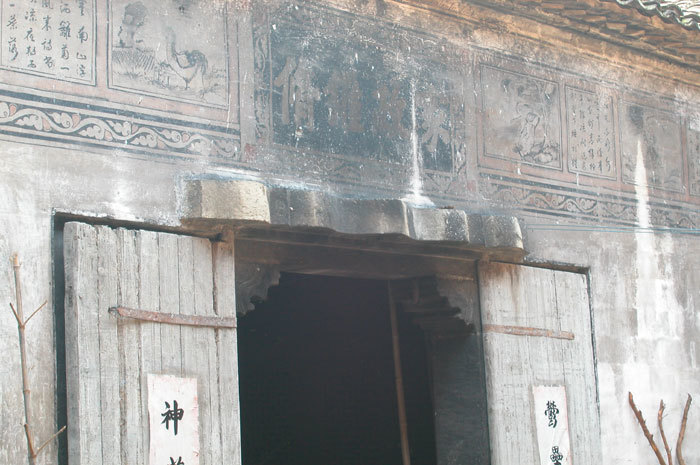 painting on wall above door, second side courtyard-1