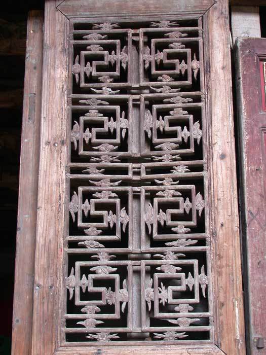 A lattice work on the east wall of the main hall