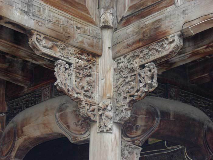 Carved bracket on the left corner