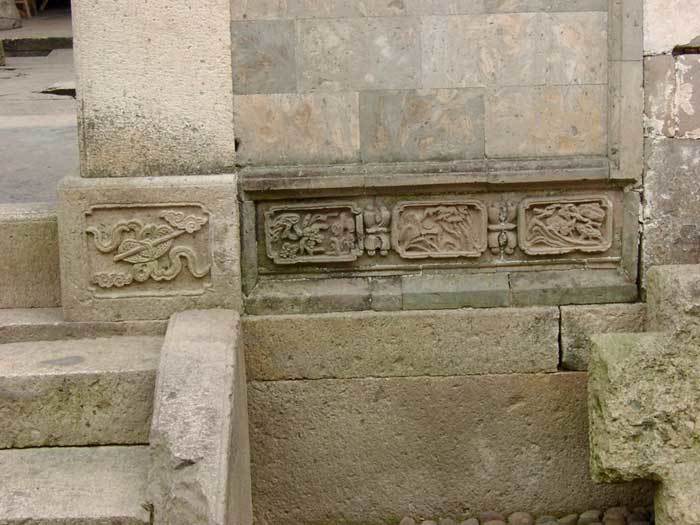 Relief carvings on portal base with natural themes2