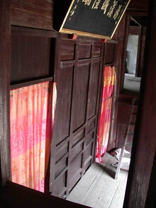 Carved, painted beams and balcony around the stage1