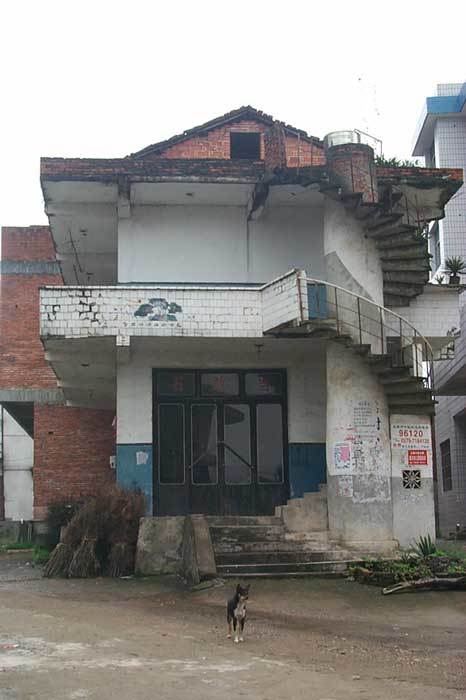 Village house on SE corner with spiral staircase Village house on SE corner with spiral staircase