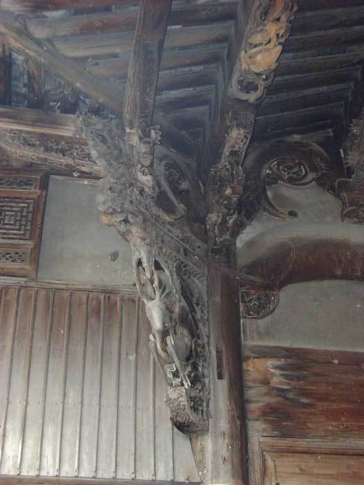 Left-hand side view of the hall-Bracket decorated with a deer