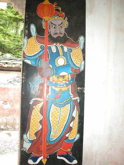 Entrance gate of Grotto Lord Temple.Gate Guardian God Weichi Gong