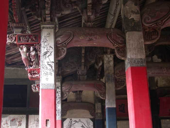 Two columns looking west between front hall and back hall. The left column has been restored.