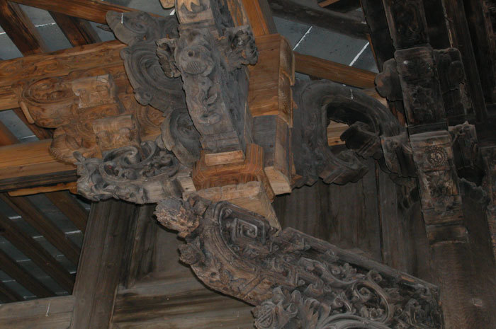 Bracket at top of column set in left wall Bracket at top of column set in left wall