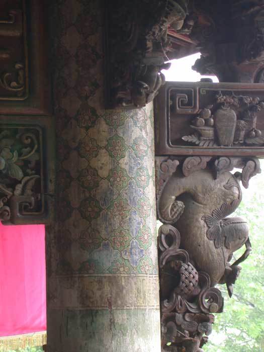 Carved bracket and painted column