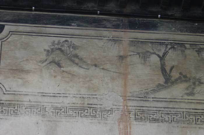 Painting on the right-hand side of the wall.willow and mountains