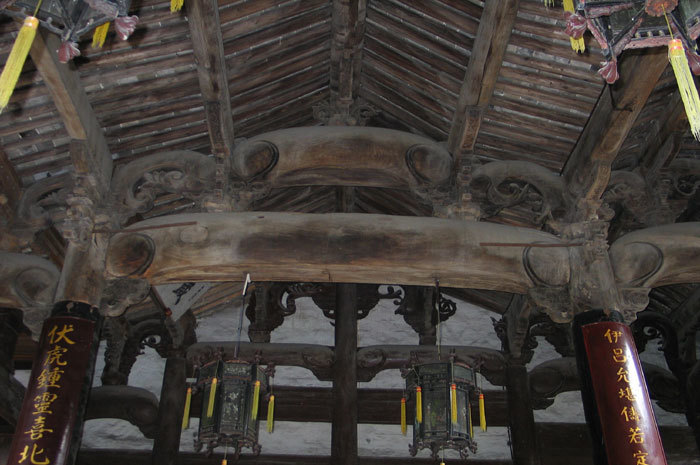 Wood carved rafters, center of hall looking northeast Wood carved rafters, center of hall looking northeast