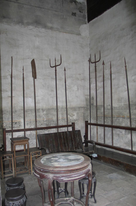 Complete set of ten pikes (halbeards) on left of entrance