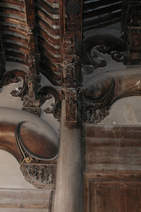 Brackets on both sides of second pillar on left wall