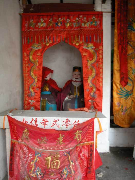 Earth god (far left)