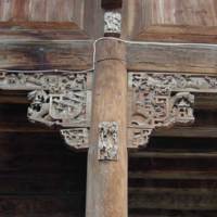 Bracket carved with landscape themes