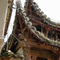 Close up of the left side of the roof line of the tower