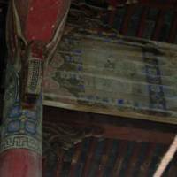 Closeup of a painting on a beam