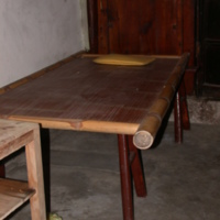 Bamboo bed with saw-house type legs