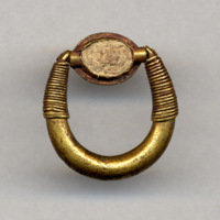 Finger Ring [Scaraboid] (Egyptian or Egyptianising type from Late Bronze Age, 1550-1050 BCE, gold and glazed composition, Cyprus, British Museum 1897,0401.276)