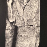 Goddess of High Rank, Smelling a Flower (18th century BCE).jpg