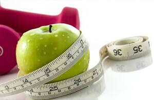 fruta y cinta de medicion