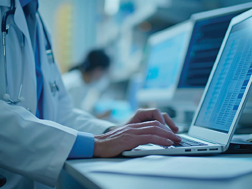Physician with Laptop