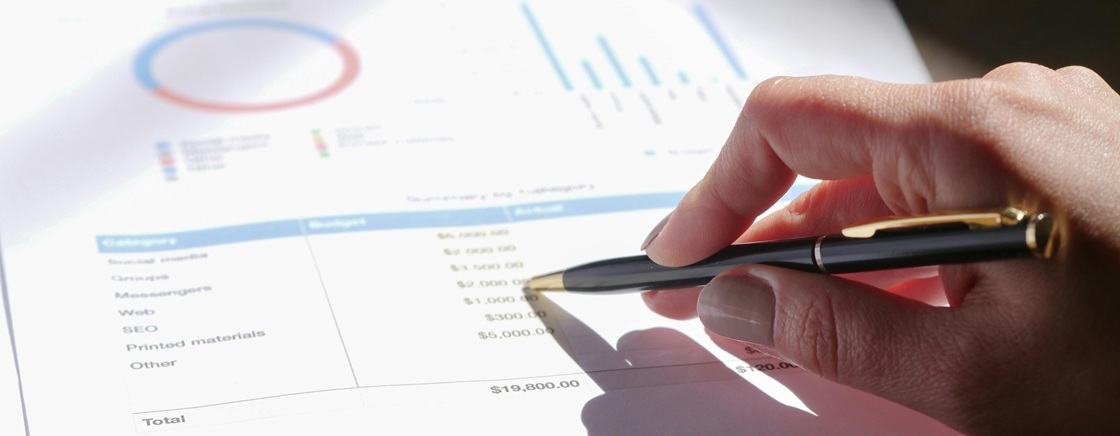 Professional analyzing financial reports generated by modern accounts receivable automation software.