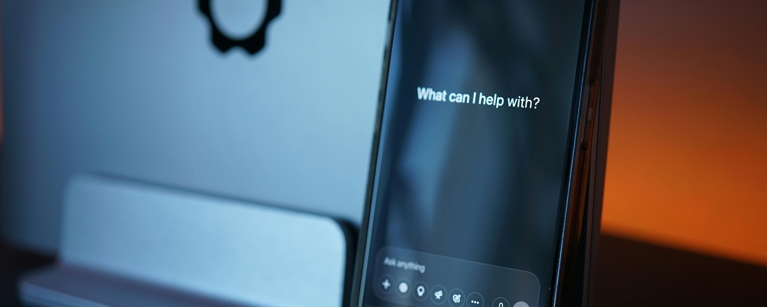 A smart phone screen displaying an AI workflow assistant, highlighting the future of mobile-first Zapier alternatives.