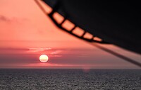 Zonsondergang op zee