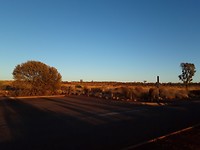 Zonsopkomst achter Ayers Rock