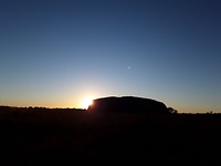 Zonsopkomst achter Ayers Rock