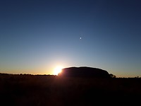 Zonsopkomst achter Ayers Rock