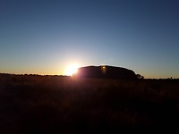 Zonsopkomst achter Ayers Rock