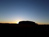 Zonsopkomst achter Ayers Rock