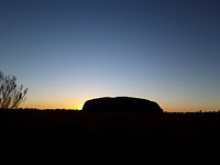 Zonsopkomst achter Ayers Rock