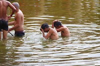 Wassen in het heilige meer