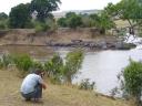 Alex fotografeert hippos in de Mara rivier