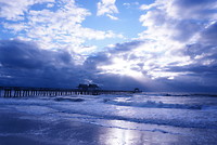 De pier van Naples met zonsondergang