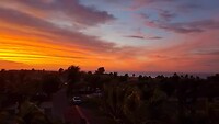 De zon gaat onder bij Coral Bay