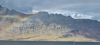Regenboog op de bergen