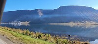 Rookpluim uit cruiseschip haven Isafjordur