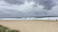 Surfers op zee