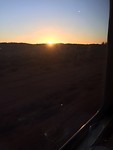 Ondergaande zon vanuit trein