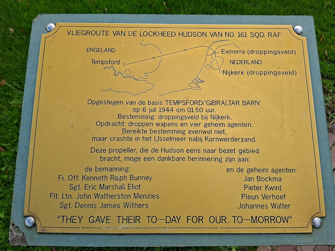 Bord bij monument Exmorra
